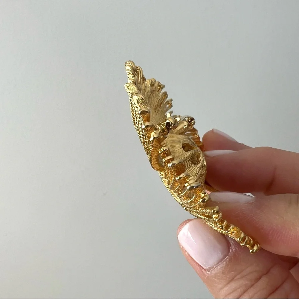 Vintage Monet pin from 1960’s with some patina on the metal - lovely for…